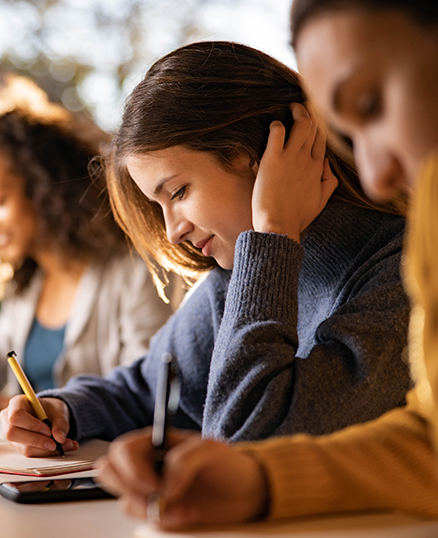 Close up of young woman studying